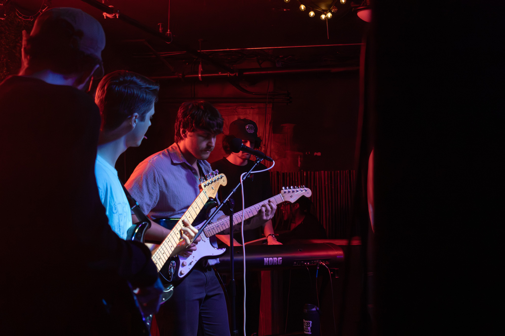 Band guitarists performing on stage
